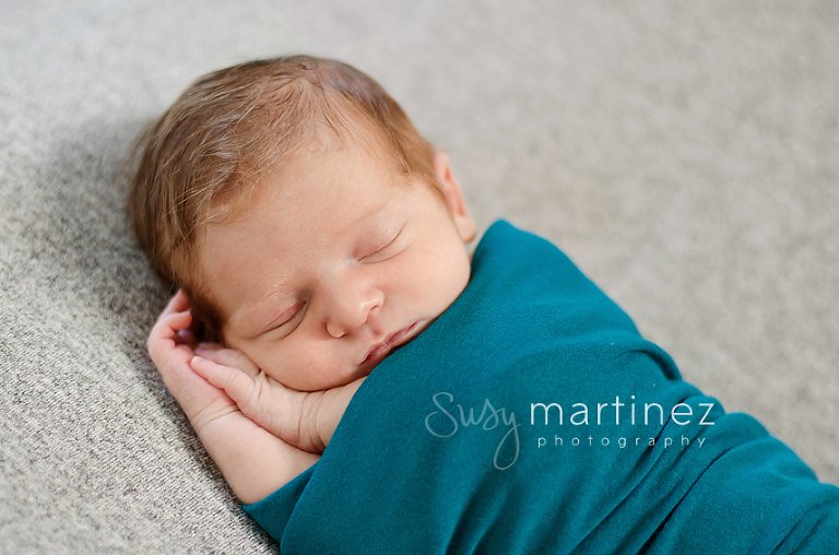 newborn with red hair