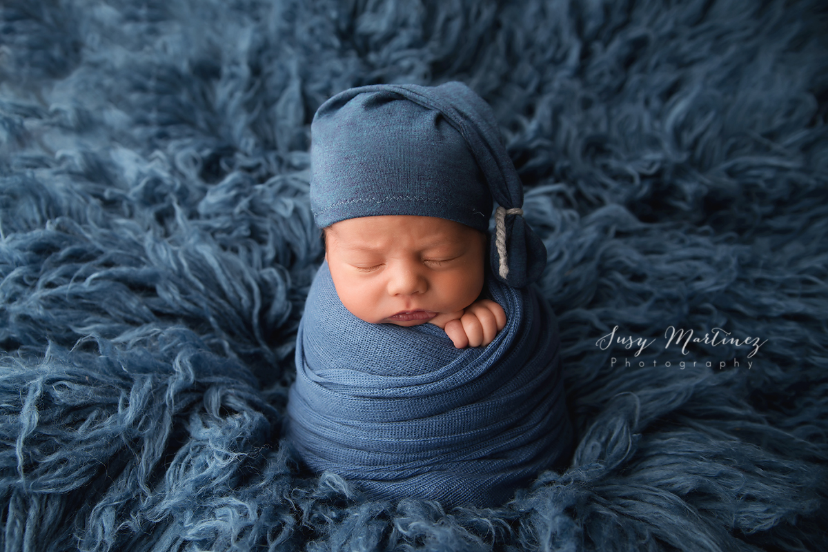 Henderson Newborn Photographer, newborn baby boy on blue