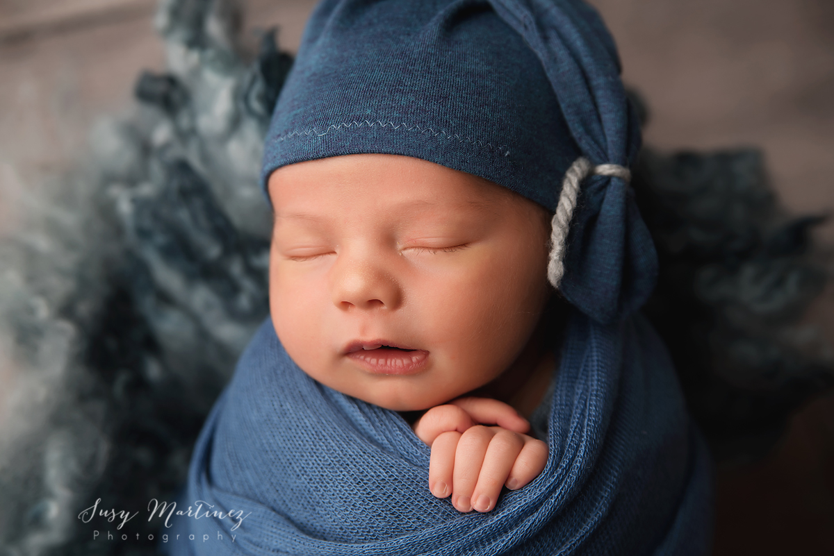 Henderson Newborn Photographer, newborn baby boy on blue