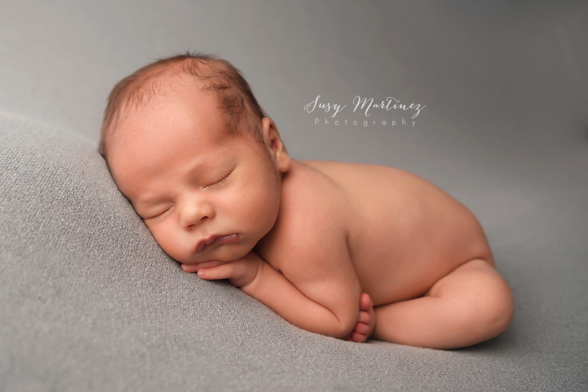 Henderson Newborn Photographer, newborn baby boy on gray
