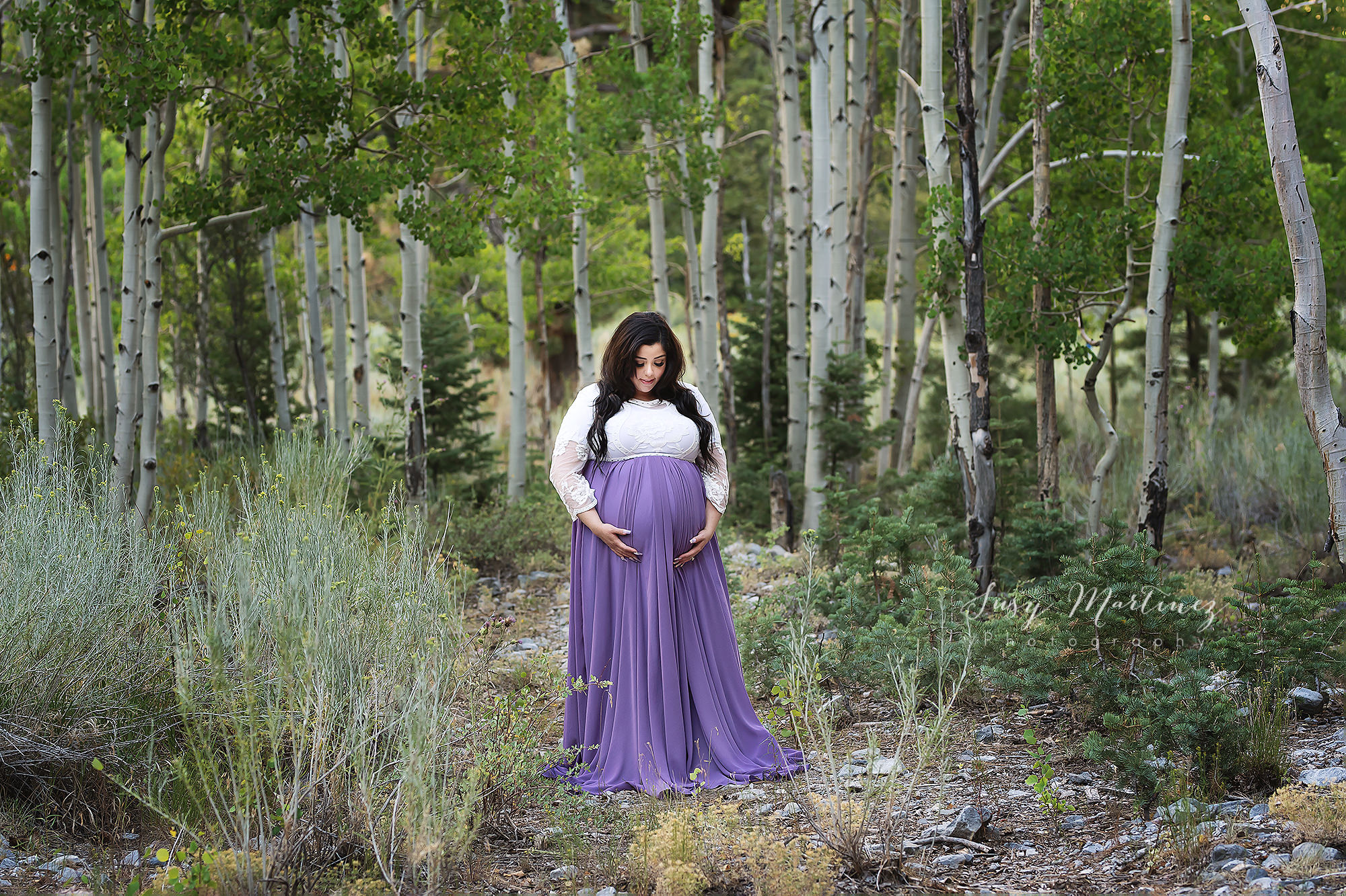 maternity portraits in the woods of mom in purple and white gown from J&L