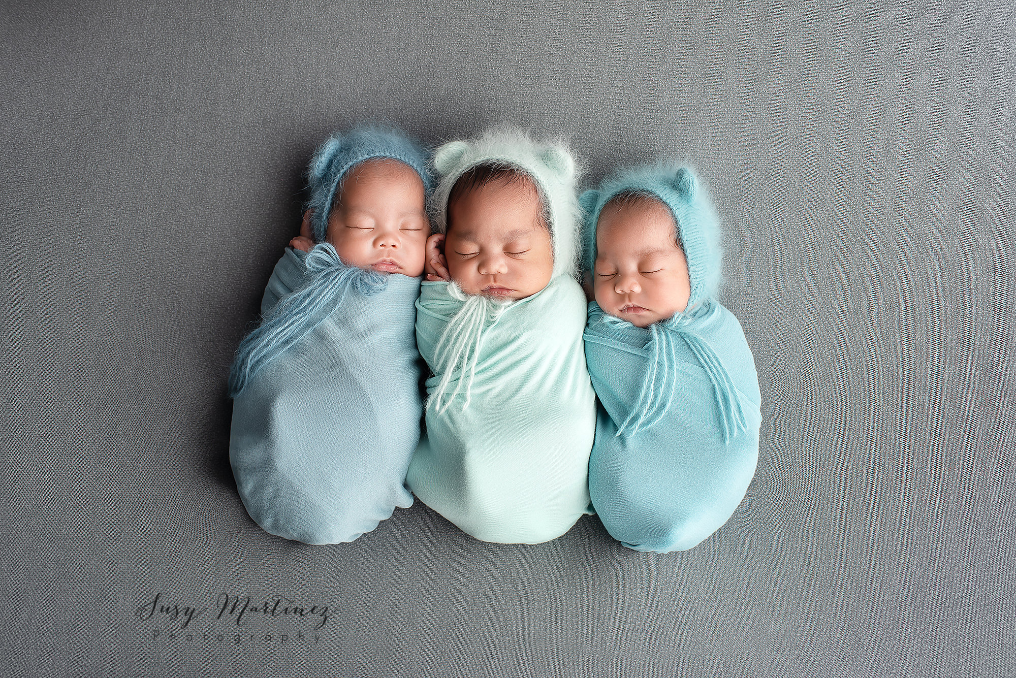 newborn session with triplets in Las Vegas studio