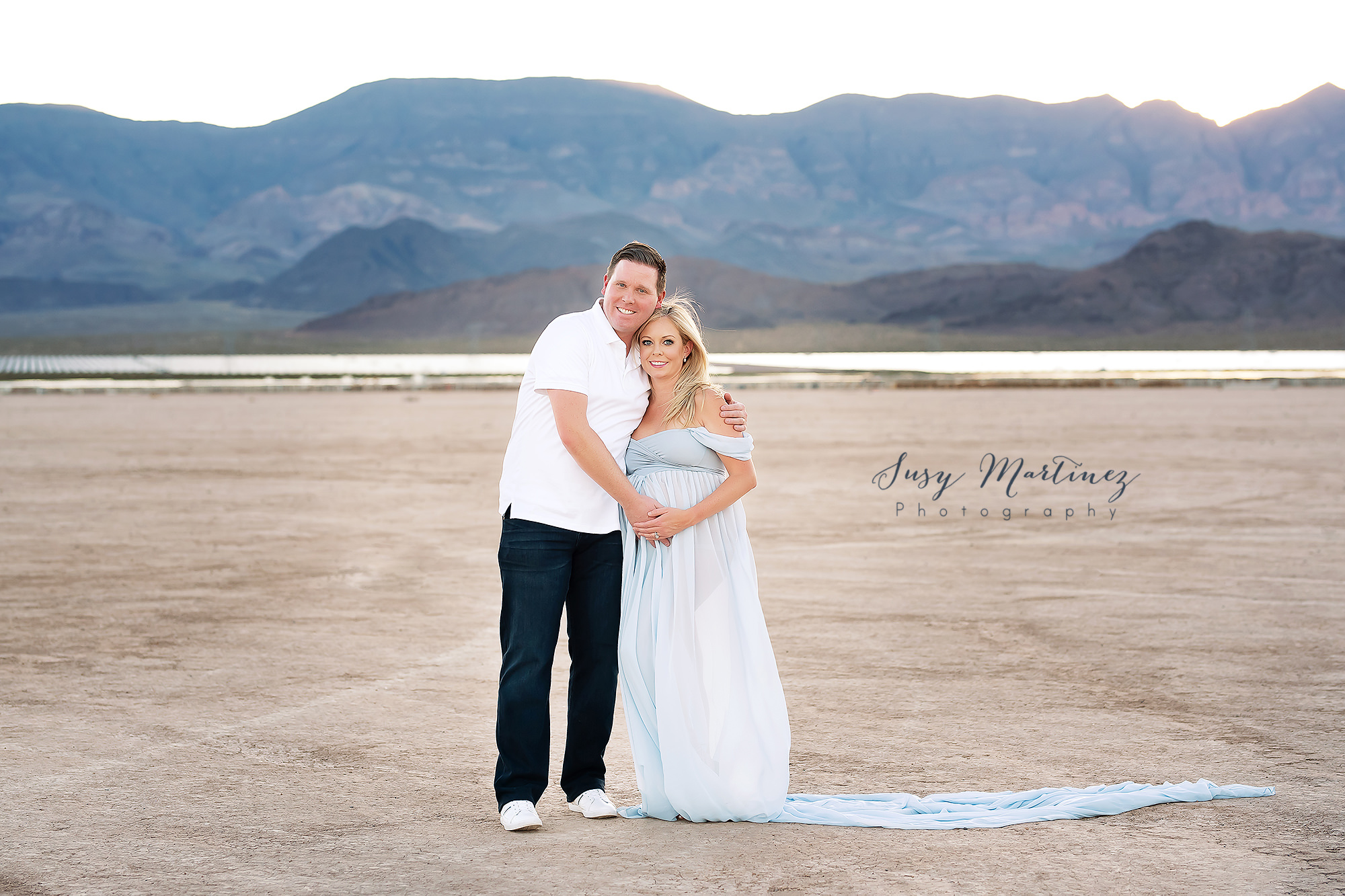 Dry Lake Bed maternity session with mom in light blue maternity dress