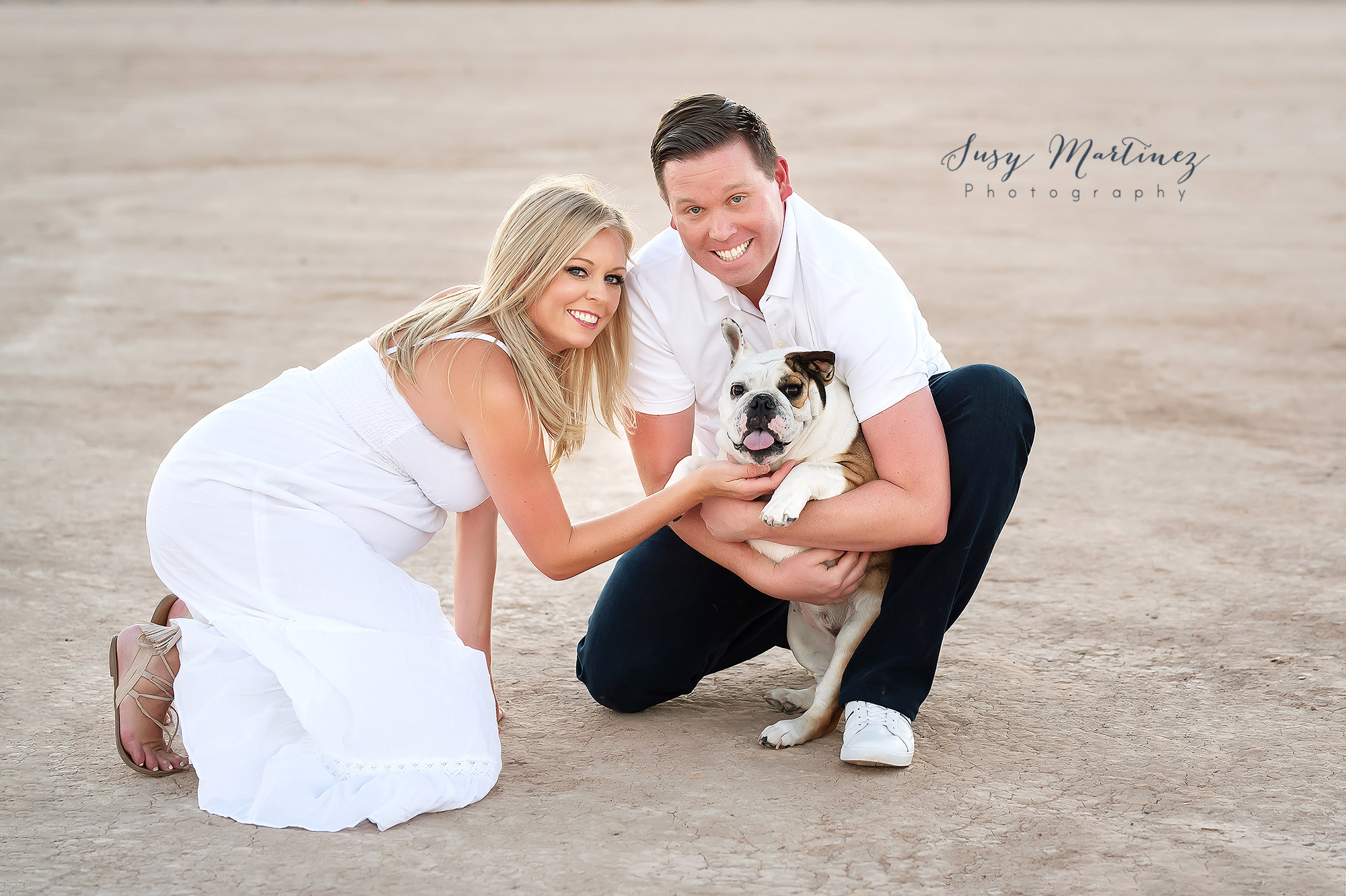 expecting parents pose with dog during Las Vegas maternity photos
