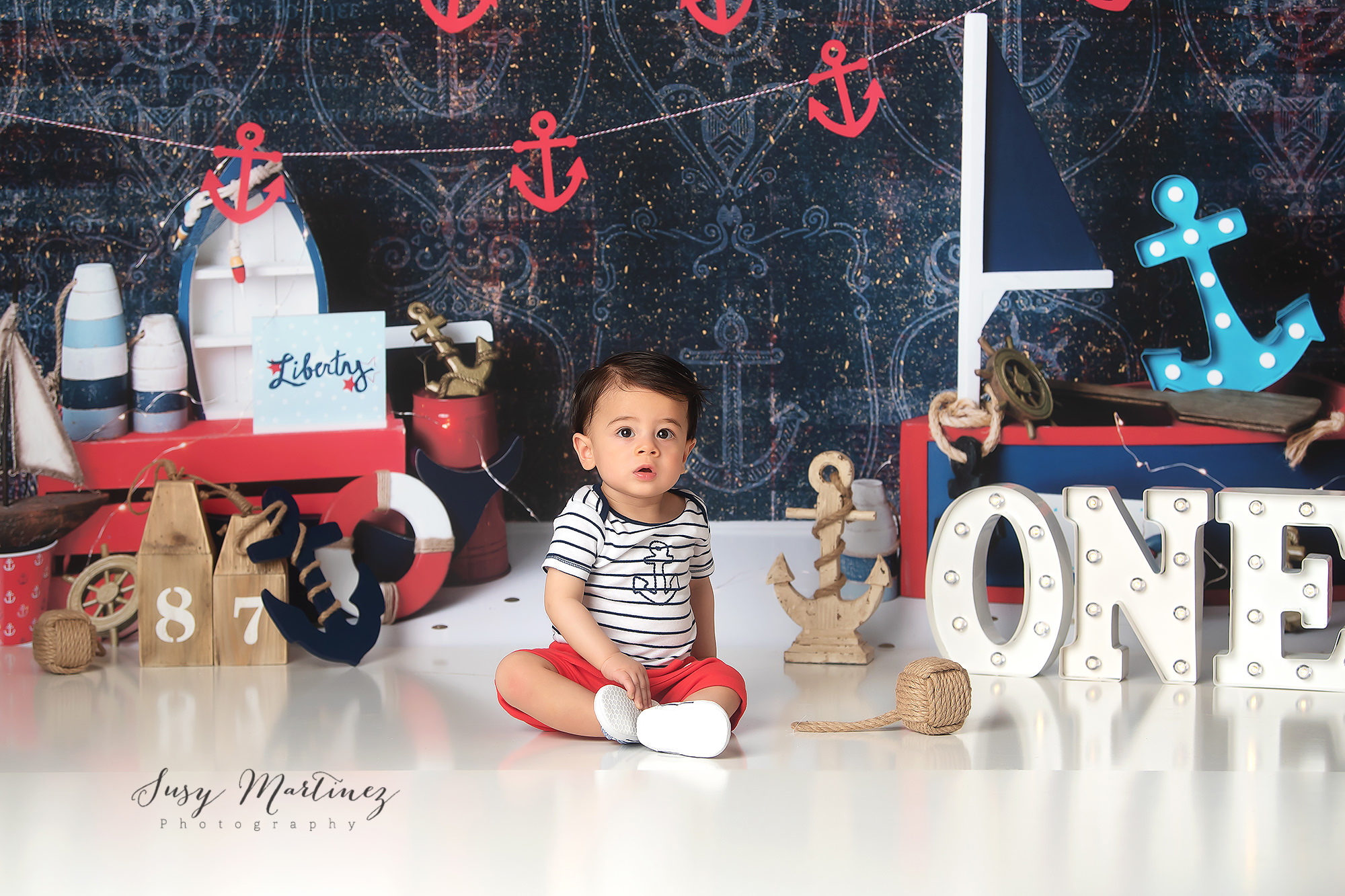 milestone portraits for baby boy to celebrate first birthday