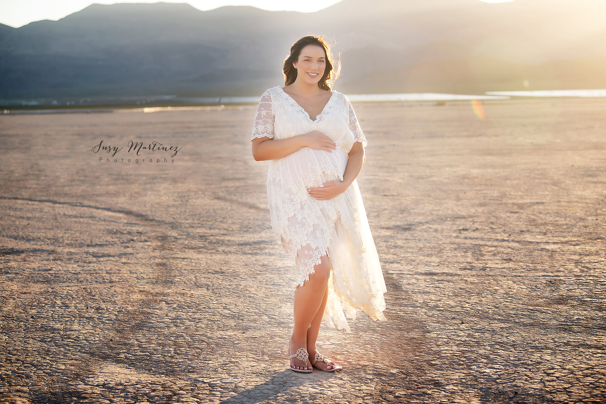 pregnant mom wears Sew Trendy Accessories Boho River Gown