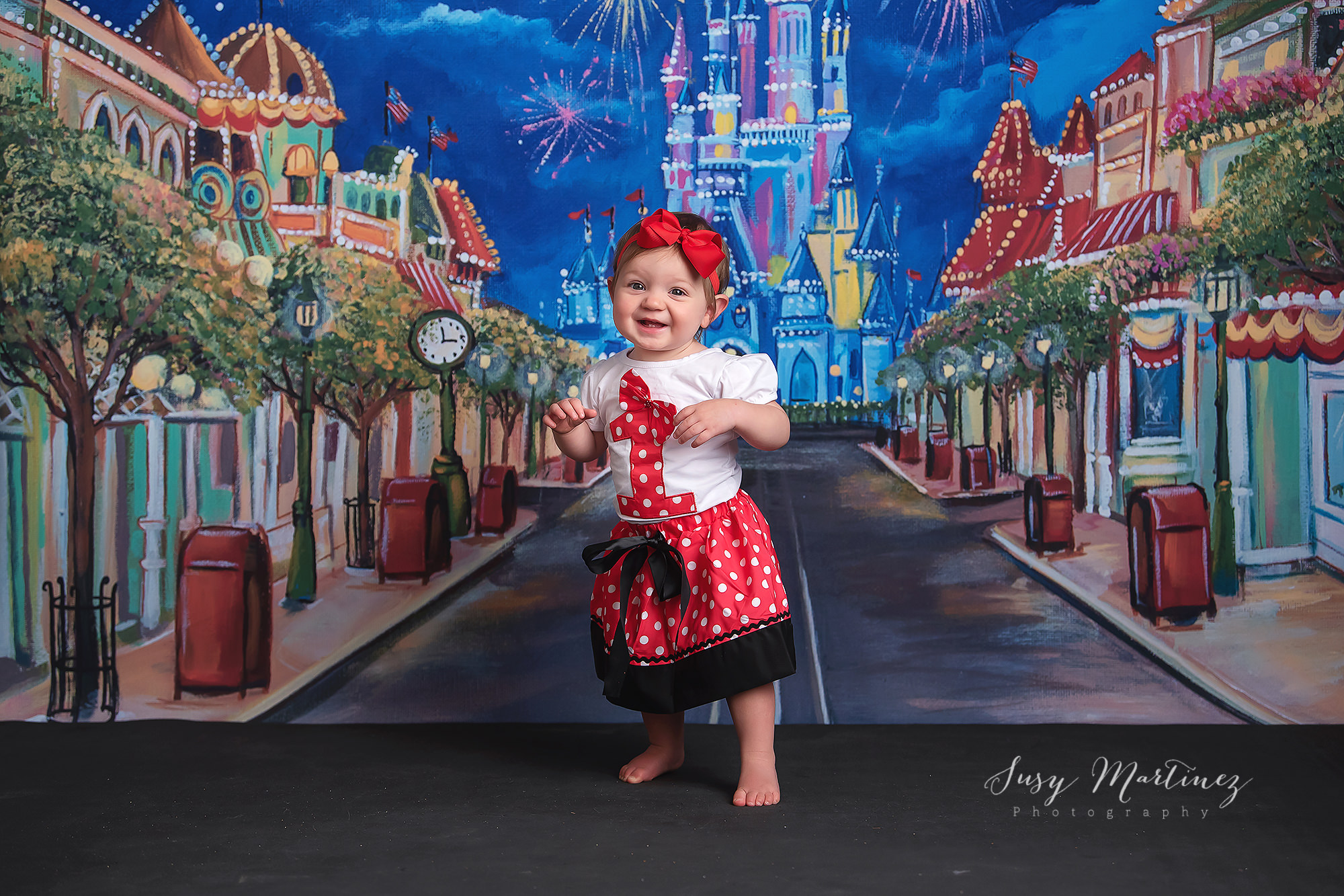 Main Street USA milestone portraits with girl in Minnie inspired outfit