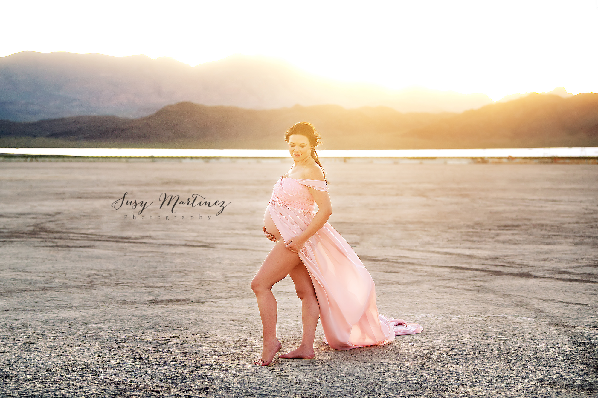 mom wears pink Sew Trendy Accessories gown during Dry Lake Bed Maternity Photos