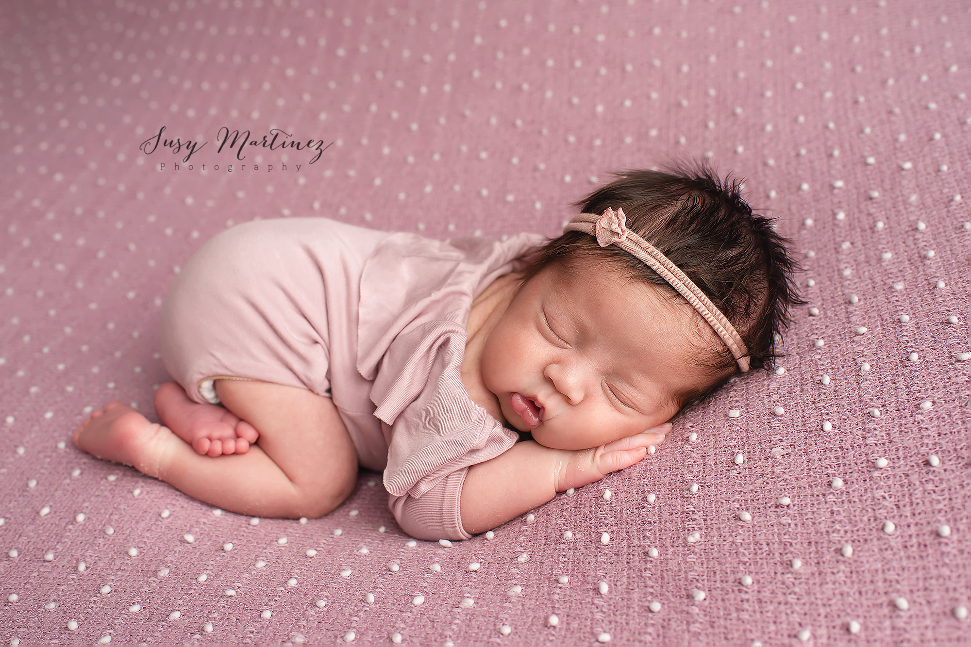 baby girl sleeps with simple headband during Las Vegas newborn session