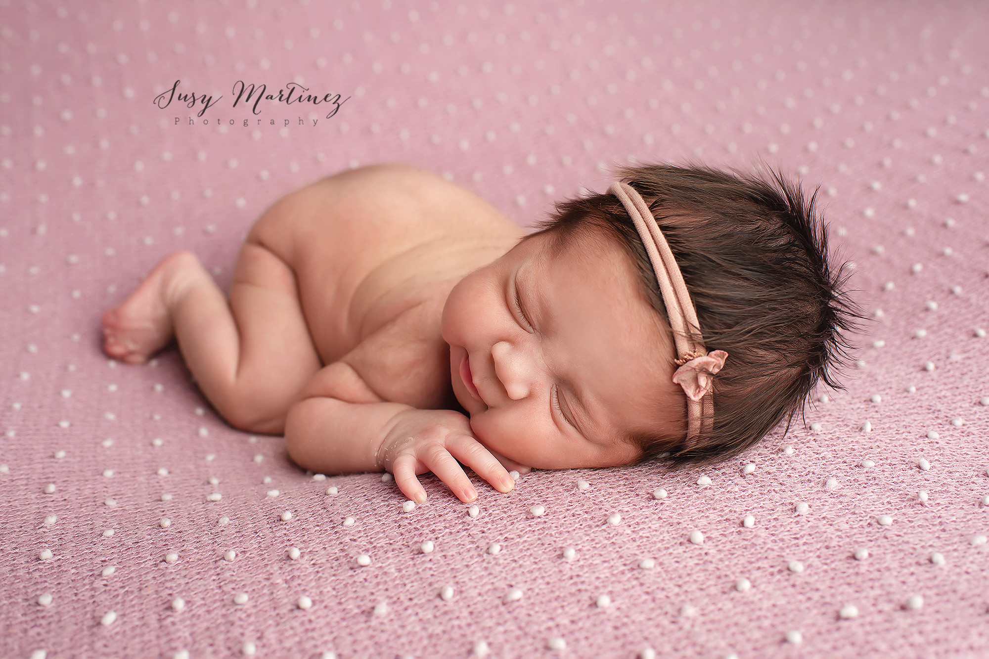 baby sleeps on pastel blanket photographed by Las Vegas newborn photographer Susy Martinez Photography