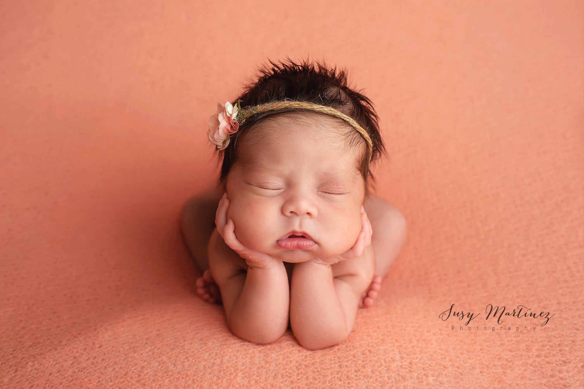 baby girl sleeps in froggy pose during Las Vegas newborn session